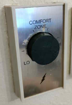 The thermostat dial installed on a thermostat
